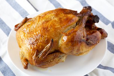 A whole roast chicken on a platter