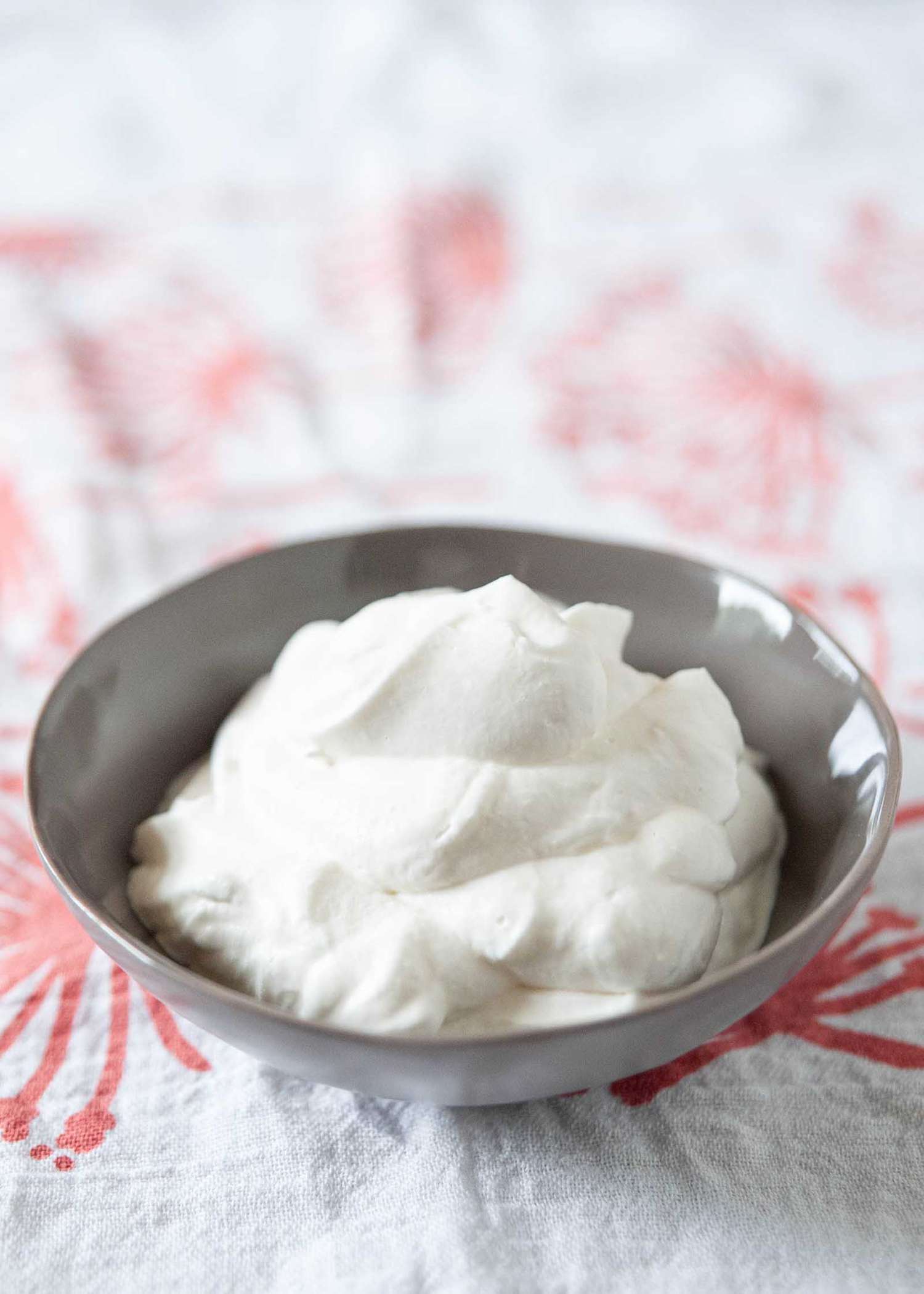 Homemade Whipped Cream - small bowl of whipped cream in grey dish