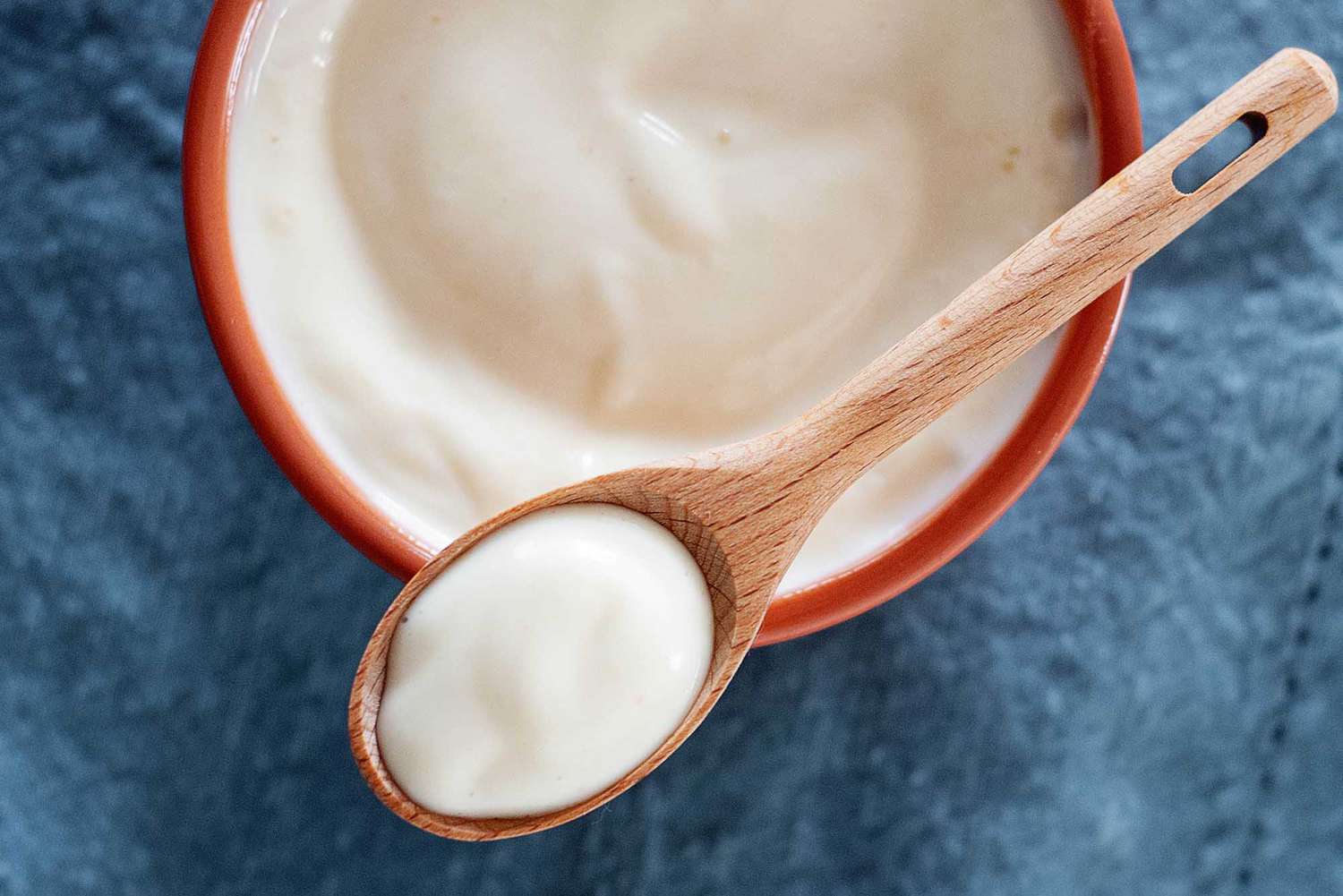 homemade mayo on a wooden spoon
