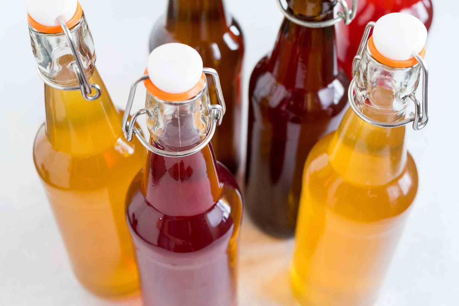 Filled jars of kombucha with the flip-tops on