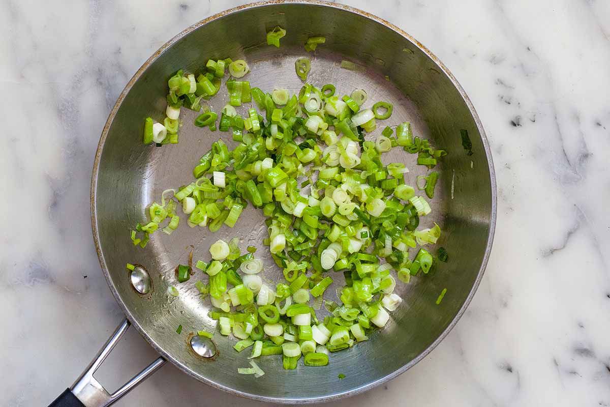 Sauteed onions in a frying pan.