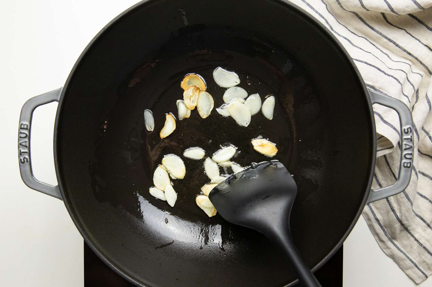 Sliced Garlic Fried in Oil for Stir-Fried Maitake Mushrooms with Garlic and Chile Oil Recipe