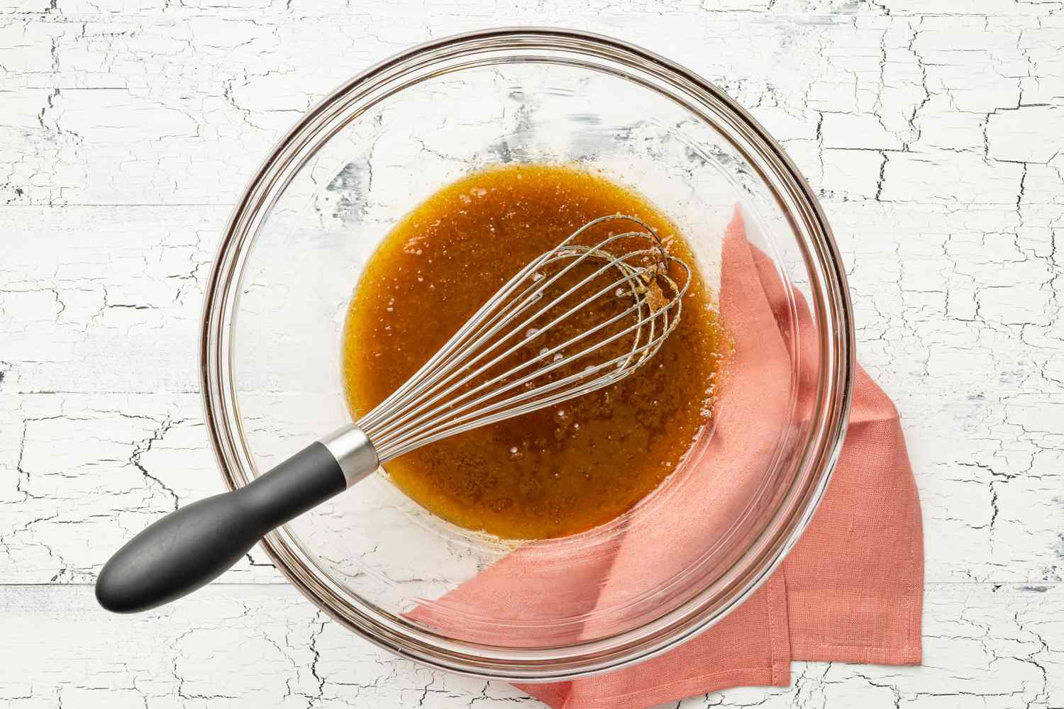Wet Ingredients Whisked Together in a Bowl for Dark and Stormy Banana Bread Recipe
