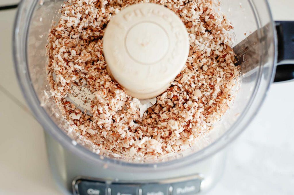Finely chop mushrooms in a food processor