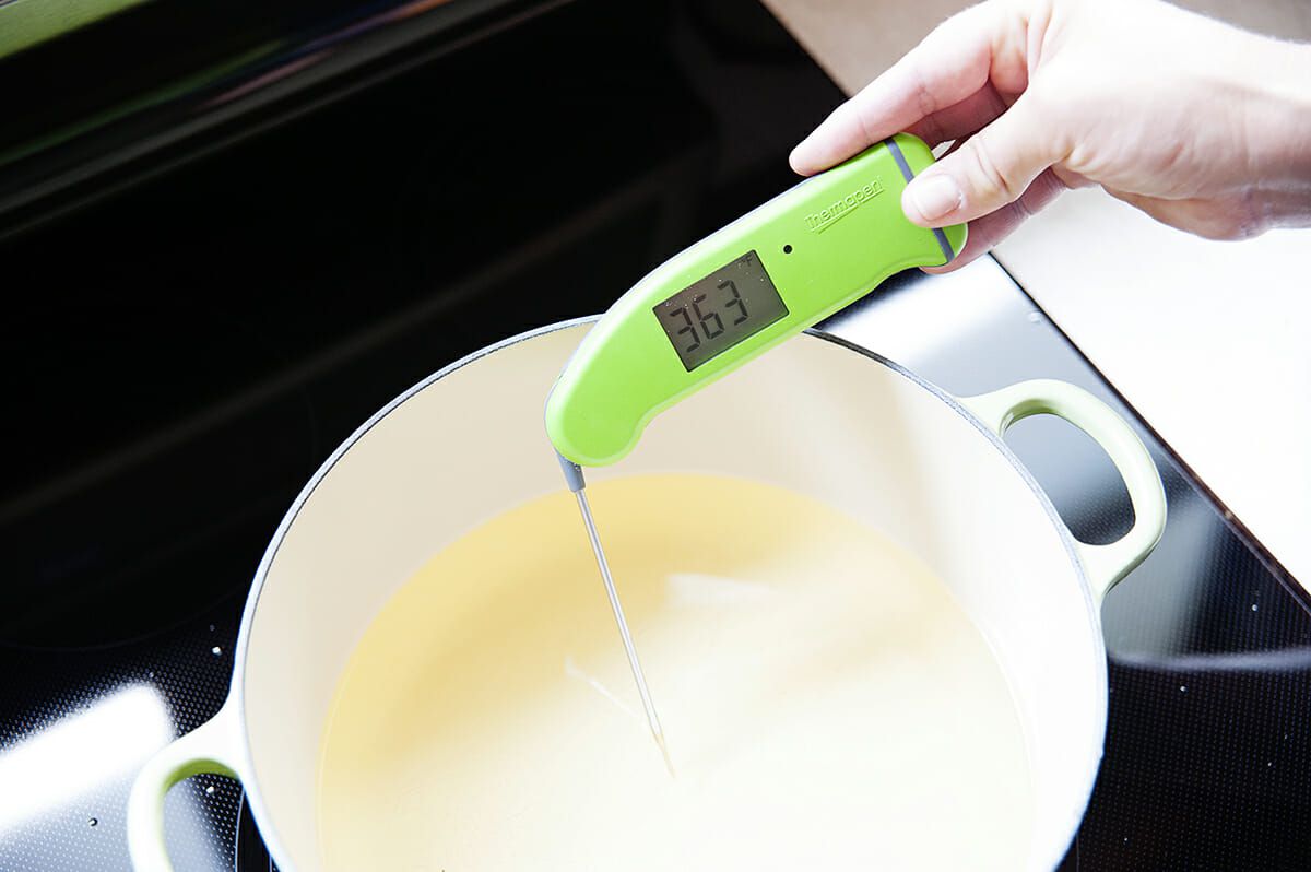 using a thermometer to check cooking oil