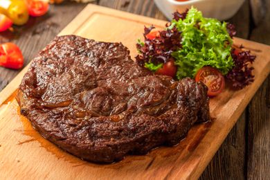 delicious looking steak on a cutting board