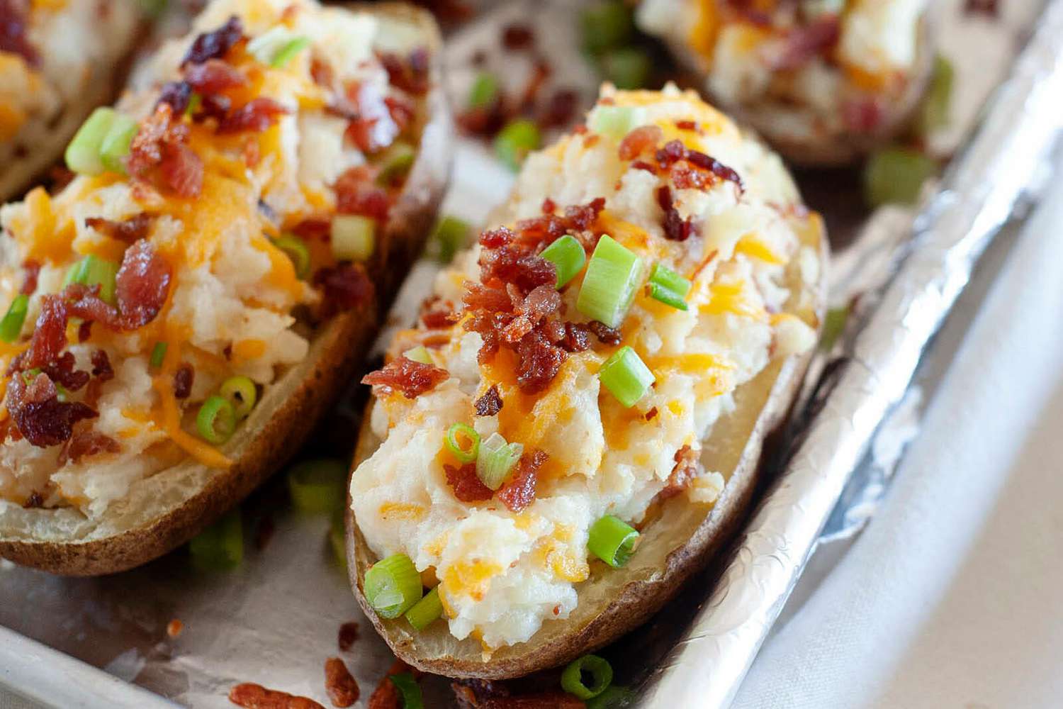 twice baked potatoes on a pan