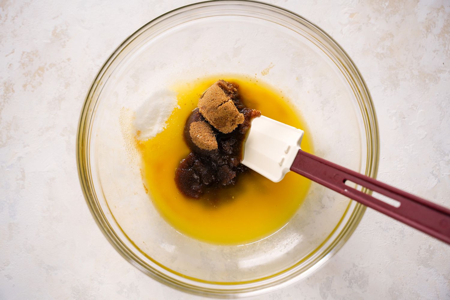 Kitchen Sink Wet Ingredients Mixed Together Using a Spatula