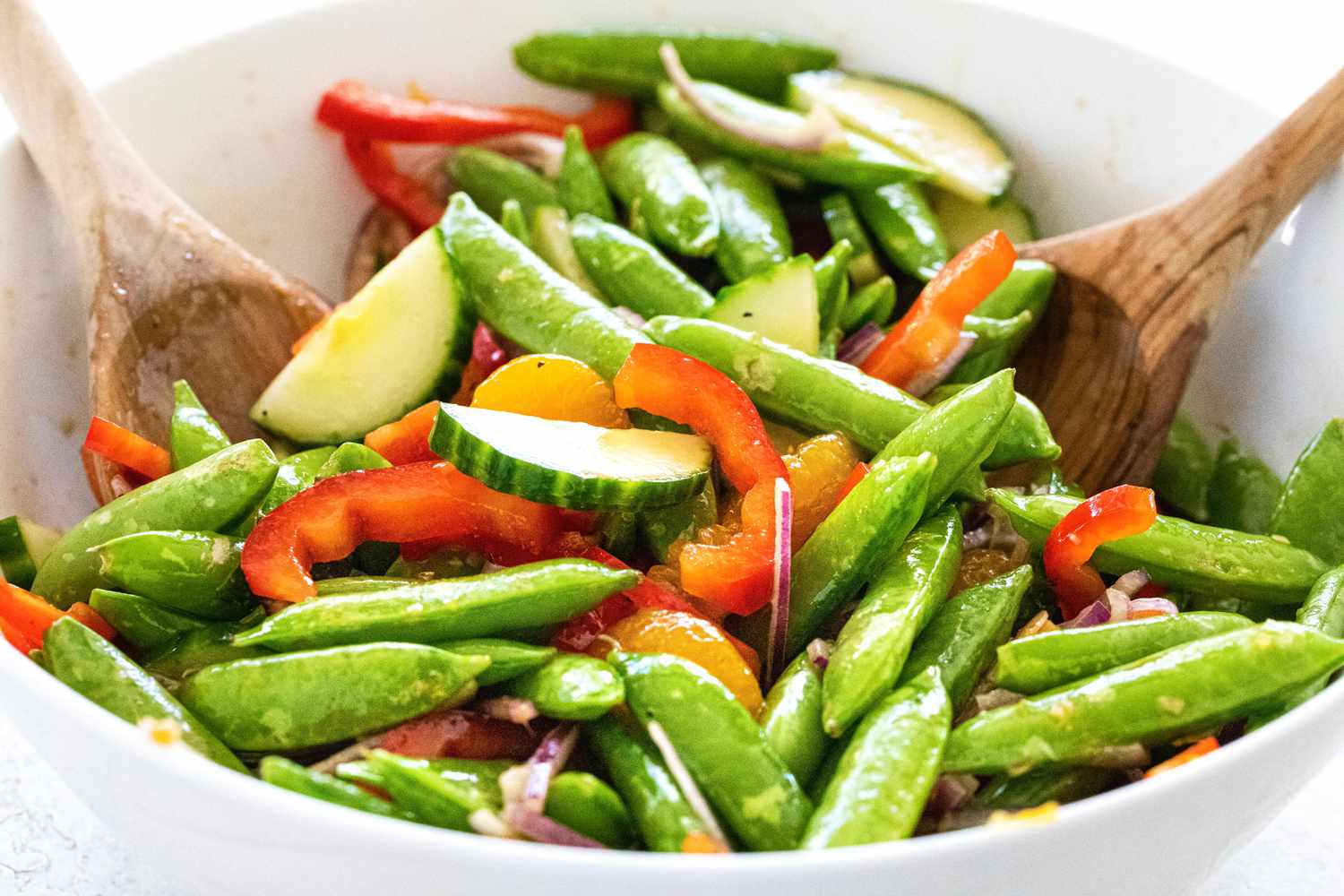 Toss spring salad.