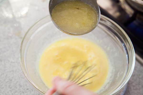 temper eggs with hot soup