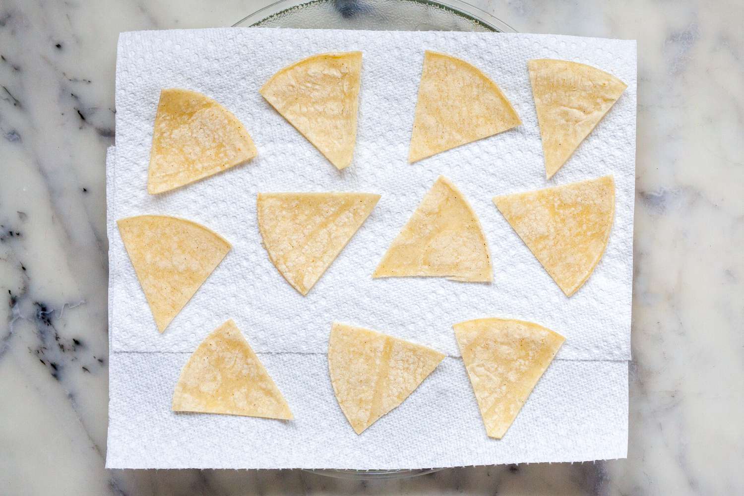 Corn chips on paper towels.