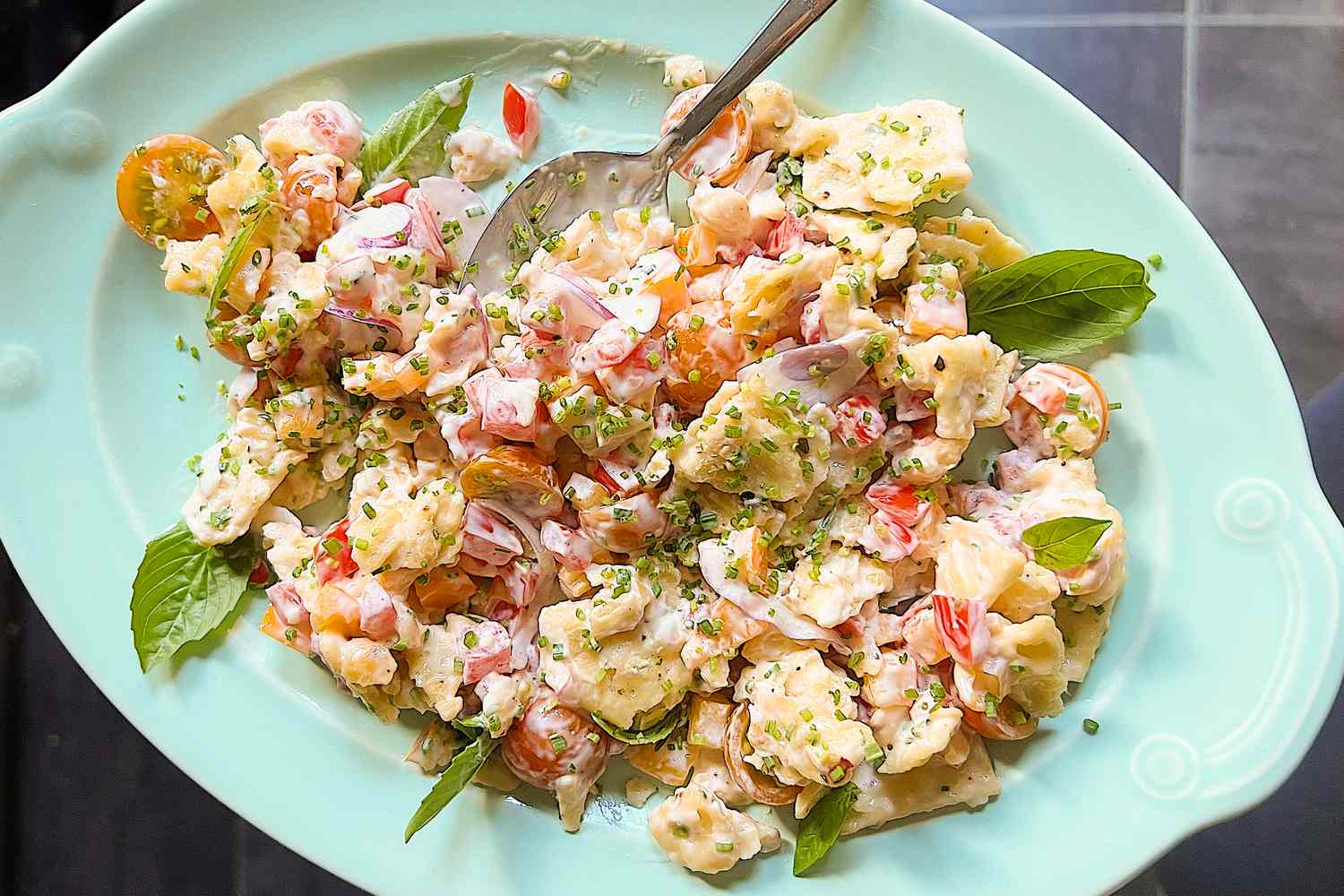 tomato crackers salad on a platter