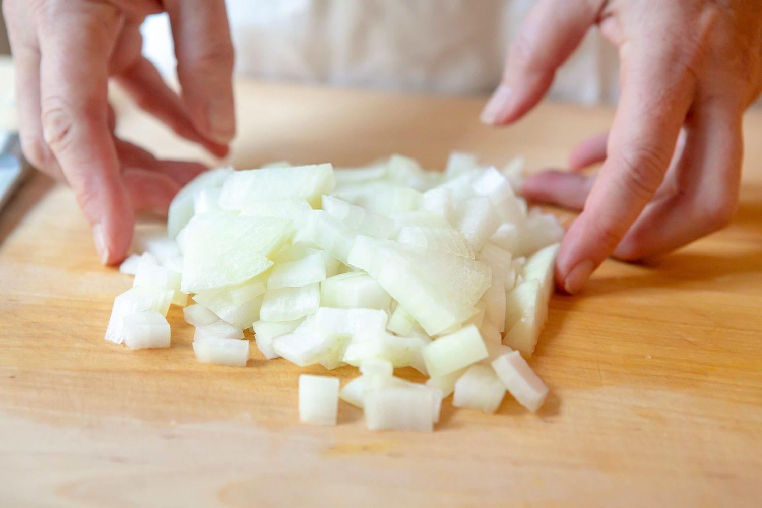 Chopped Onion on the Cutting Board for How to Chop an Onion