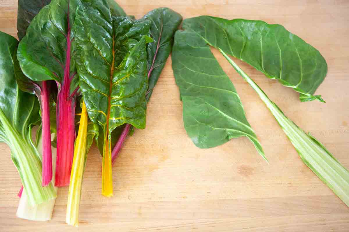 swiss chard leaves on cutting board