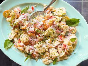 tomato crackers salad on a platter
