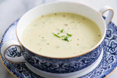 Creamy Celery Soup in a decretive blue bowl