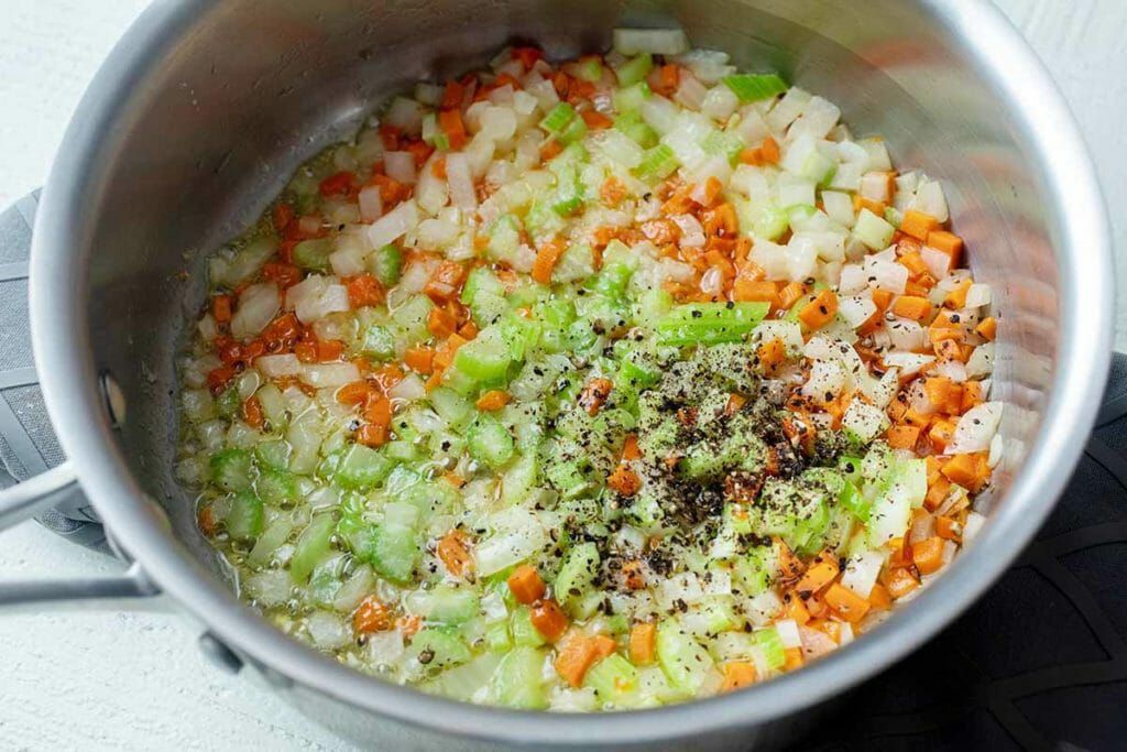 mix chopped carrots onions celery salt pepper in a bowl for leftover turkey pot pie