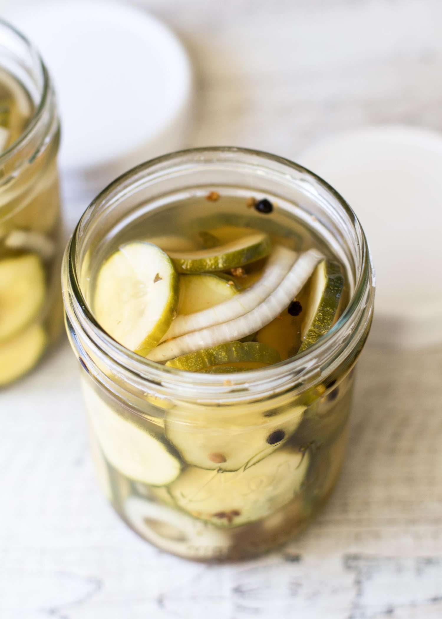 A jar of homemade refrigerator pickles in a jar