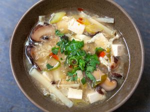 A bowl of hot sour soup.