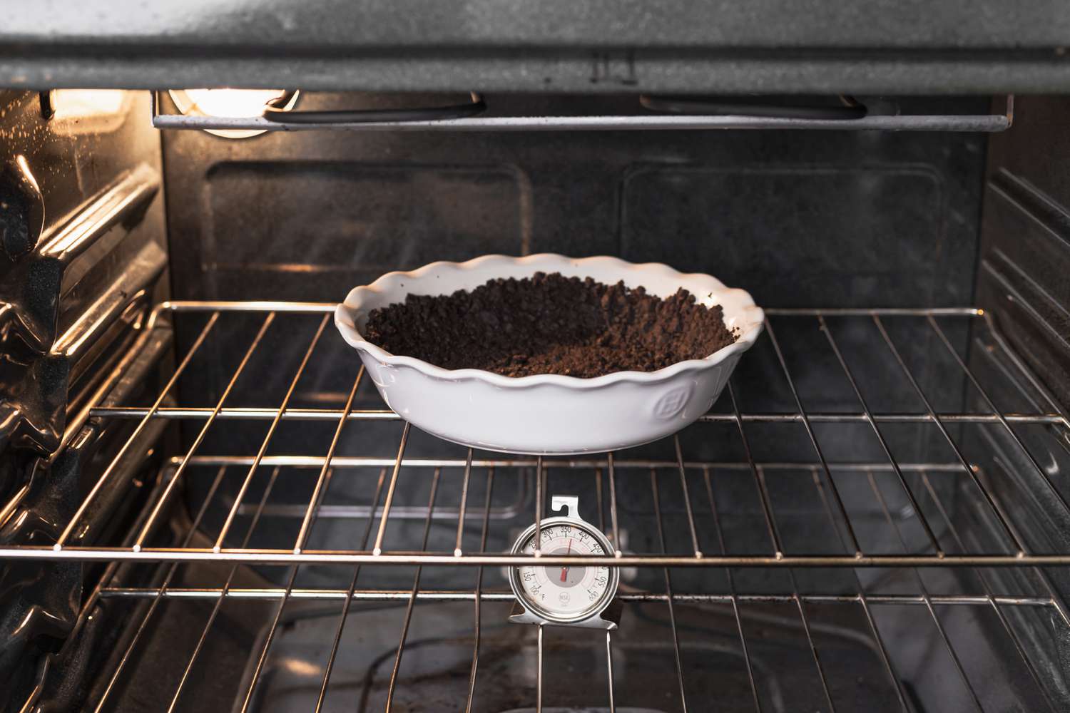 Baking the crust for a grasshopper pie recipe.