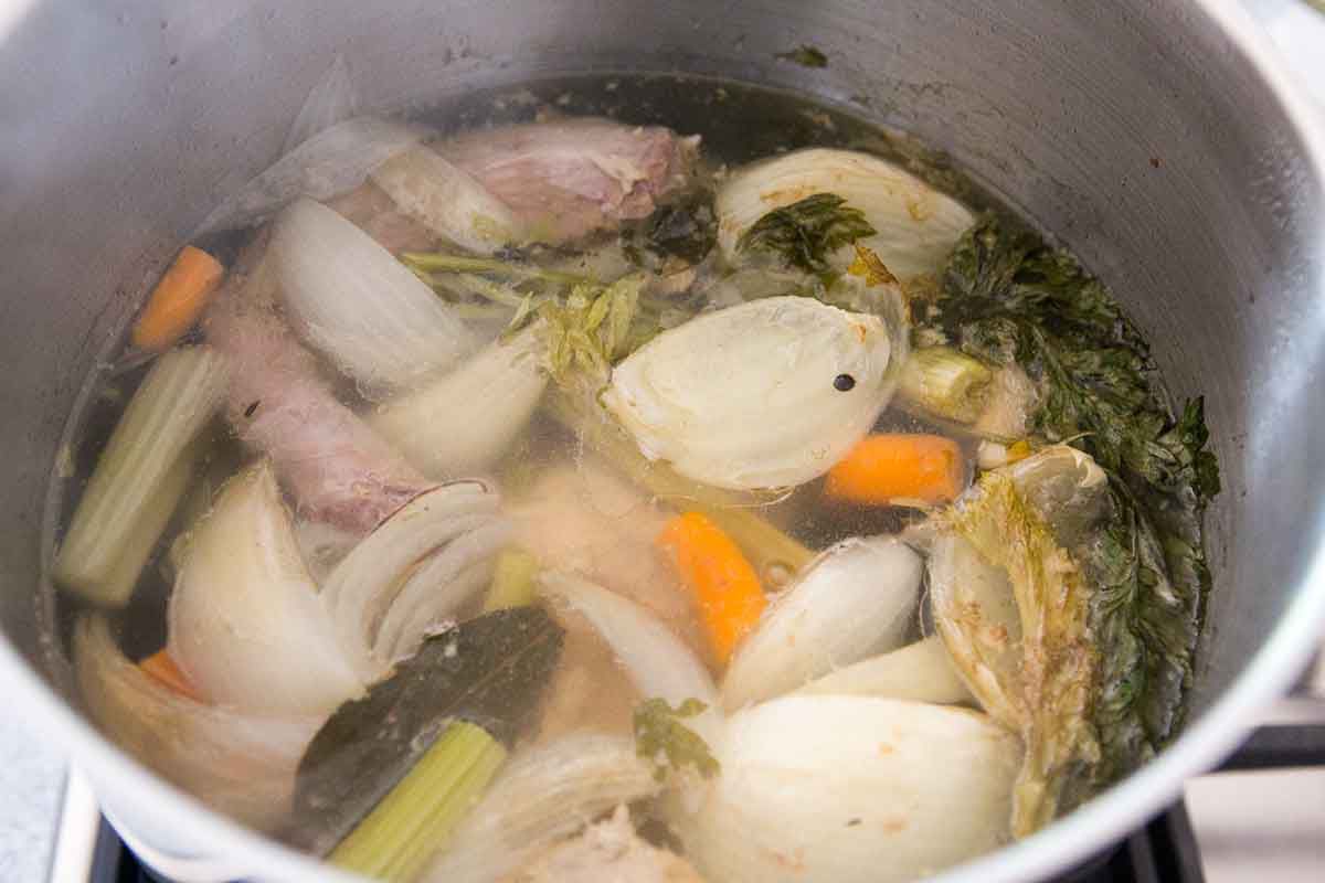 Turkey stock simmering in a pot