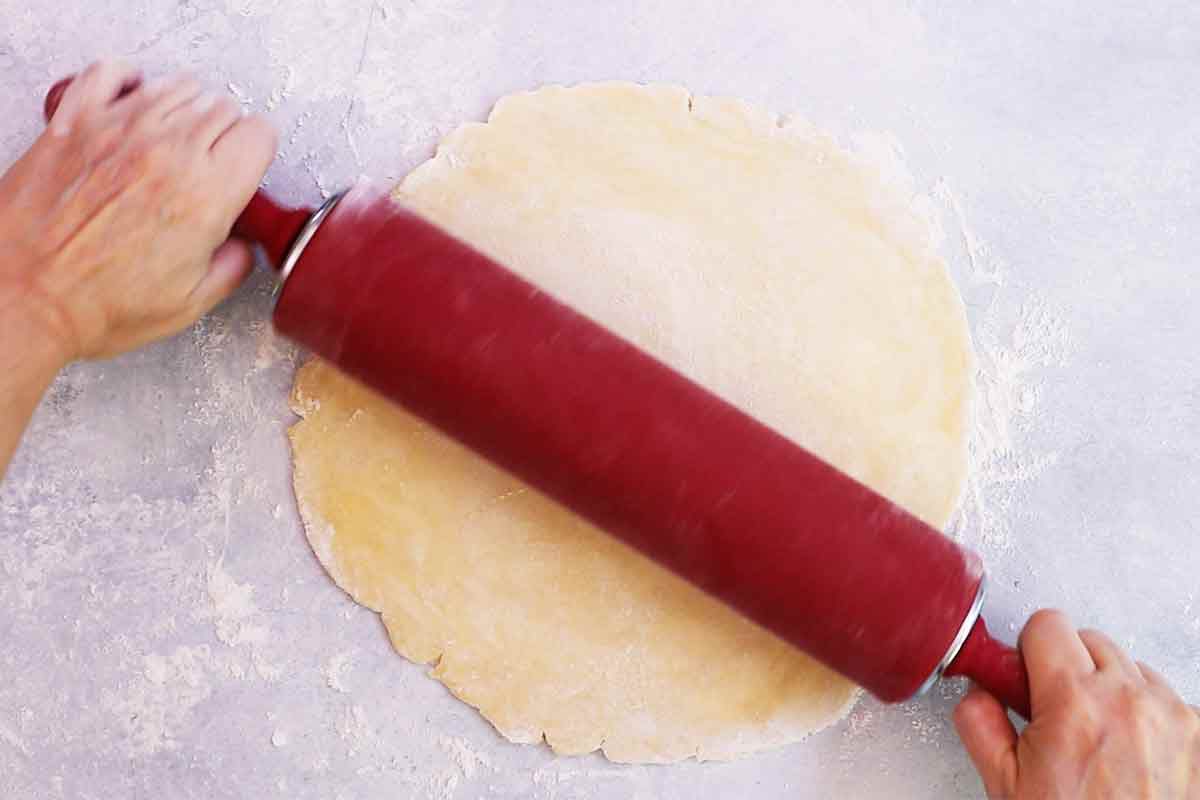 rolling out pie dough