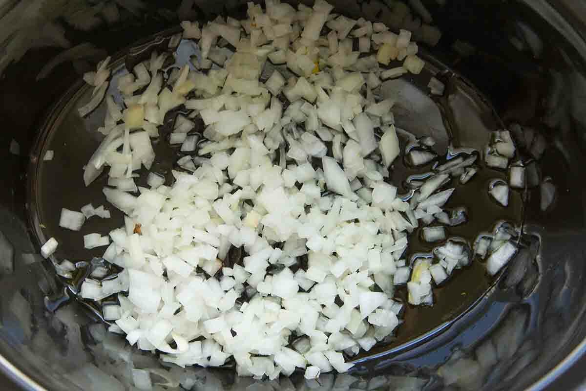 Onions in the slow cooker for chickpea curry