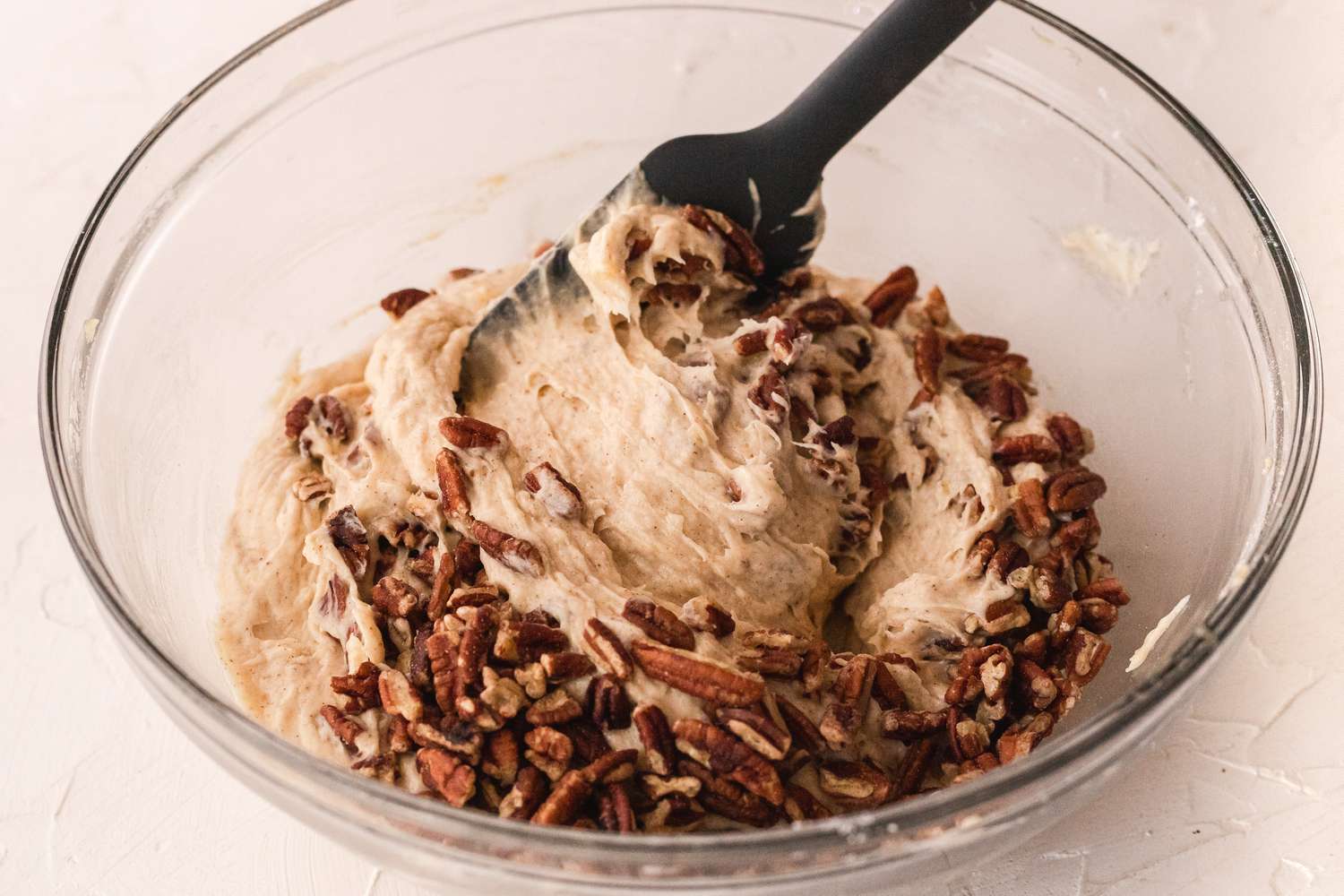 Chopped pecans added to the batter for banana bread cookies.
