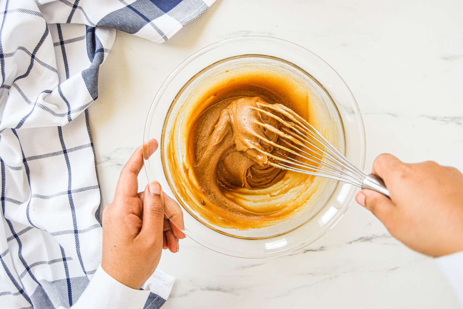 Blondie batter being whisked in a glass bowl