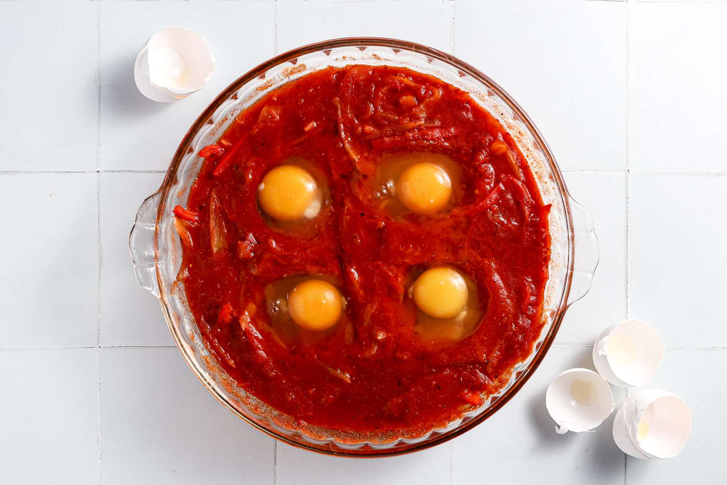 Eggs Cracked into the Wells in the Sauce for Microwave Shakshuka 
