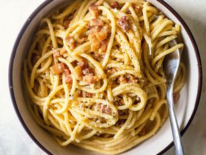 Spaghetti Carbonara in a bowl with a fork