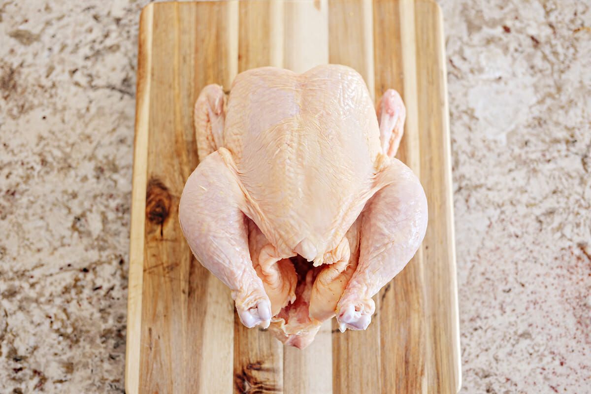 Truss a chicken with string