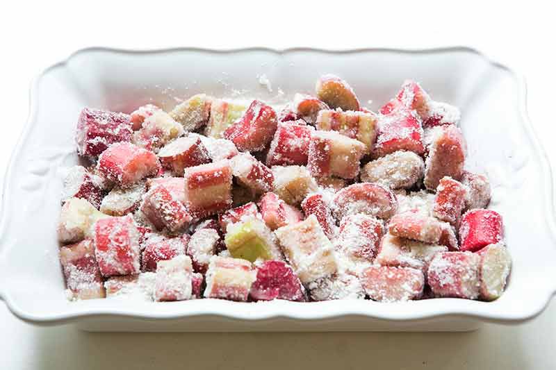 raw rhubarb tossed with sugar before baking