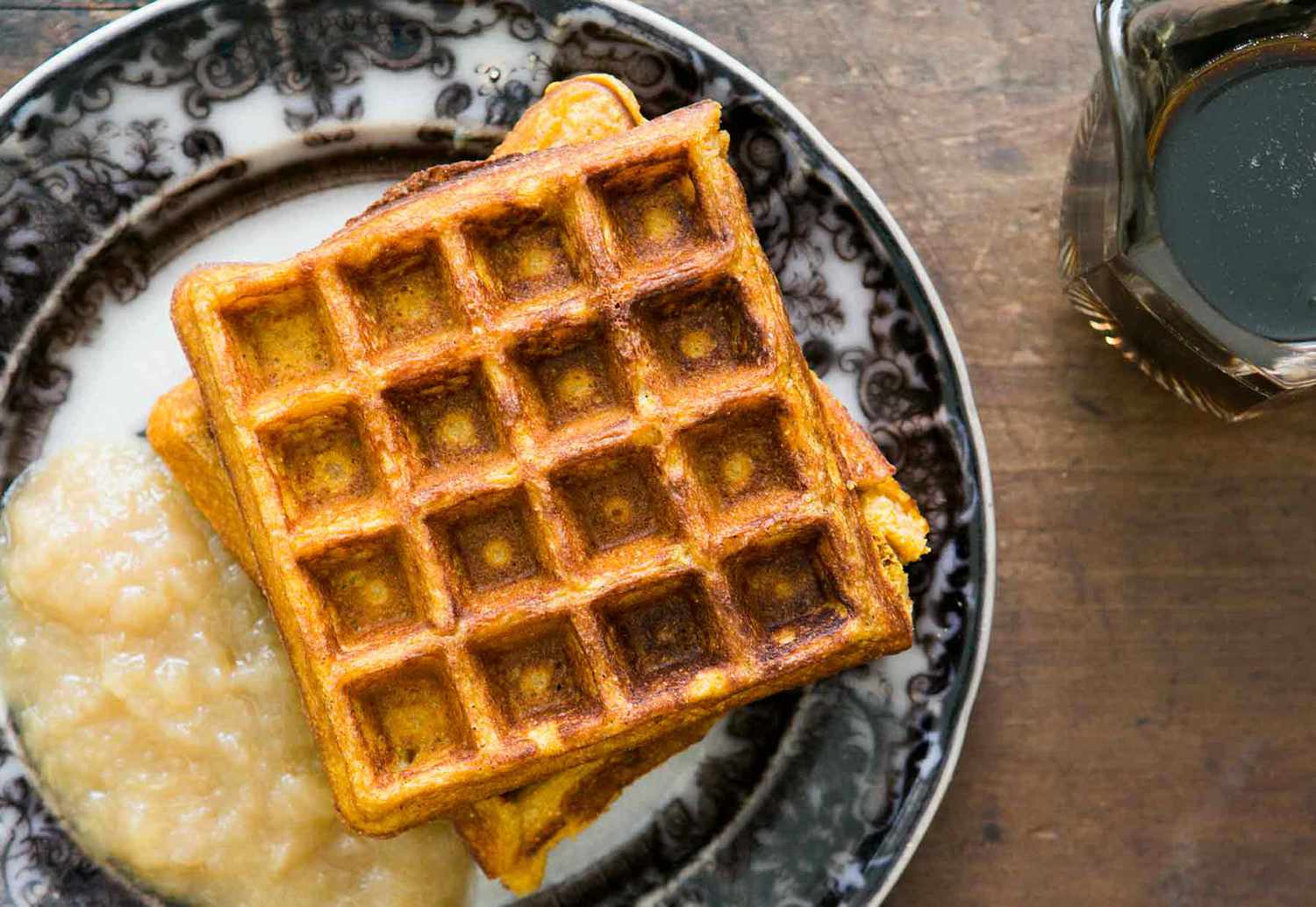 Pumpkin Waffles on plate with applesauce