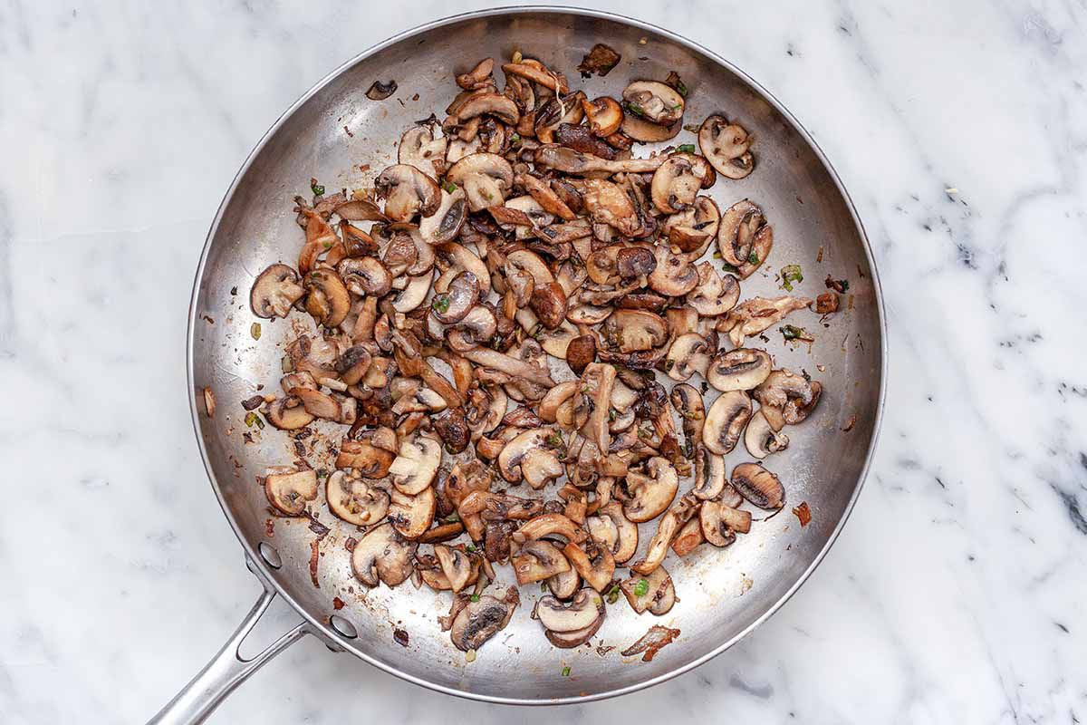 Vegetarian Quesadilla Recipe - silver pan with sauteed mushrooms