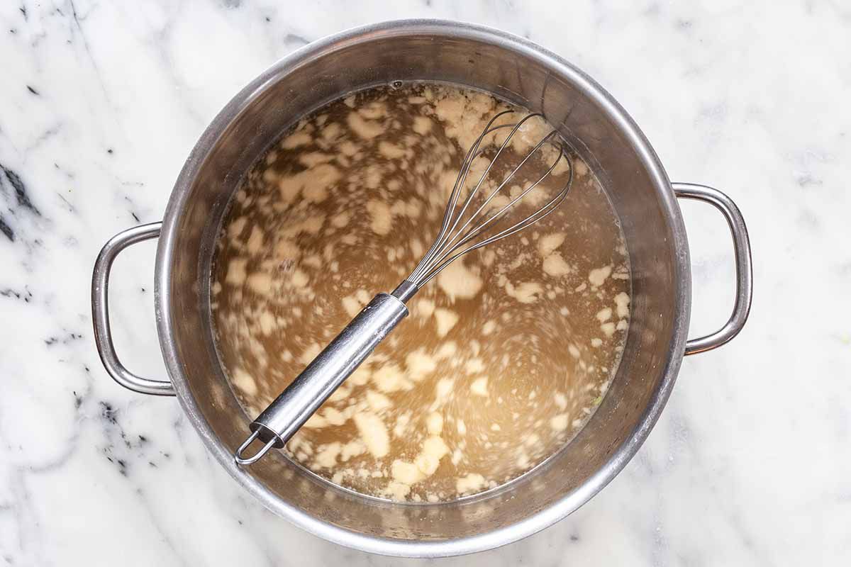 Easy Vegetarian Shepherd’s Pie-sauce pan with liquid, flour and butter and whisk