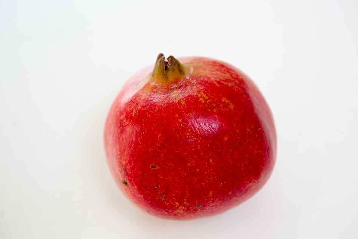 how to open a pomegranate - crown side up