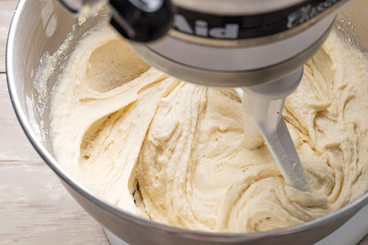 Strawberry Shortcake Cake Batter After Egg Is Added (Batter in a Stand Mixer Being Mixed by the Paddle Attachment)