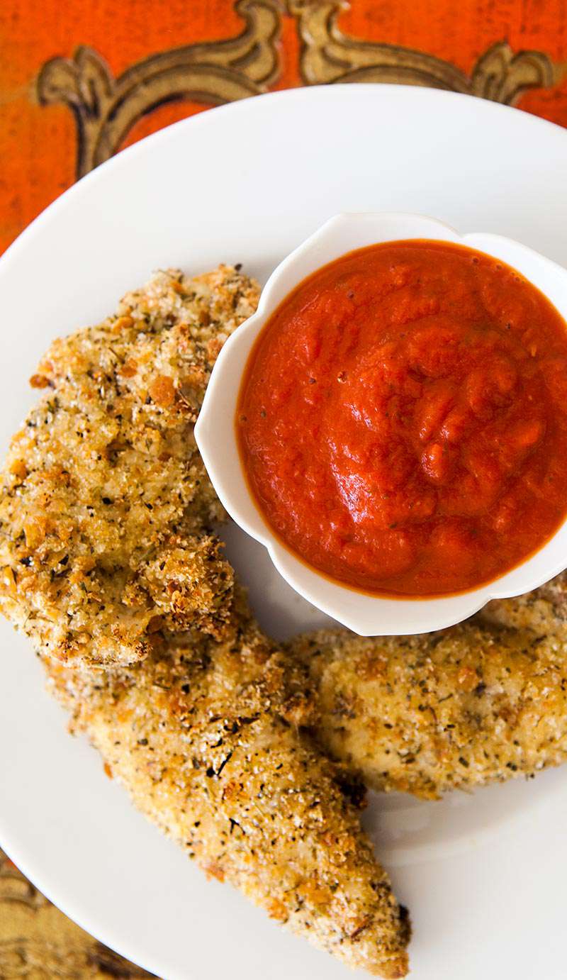 Chicken tenders with sauce on a plate