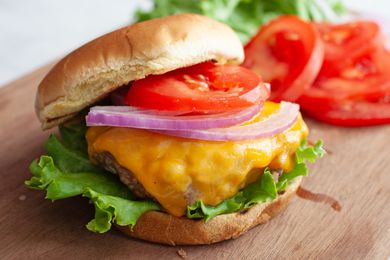A burger on a cutting board