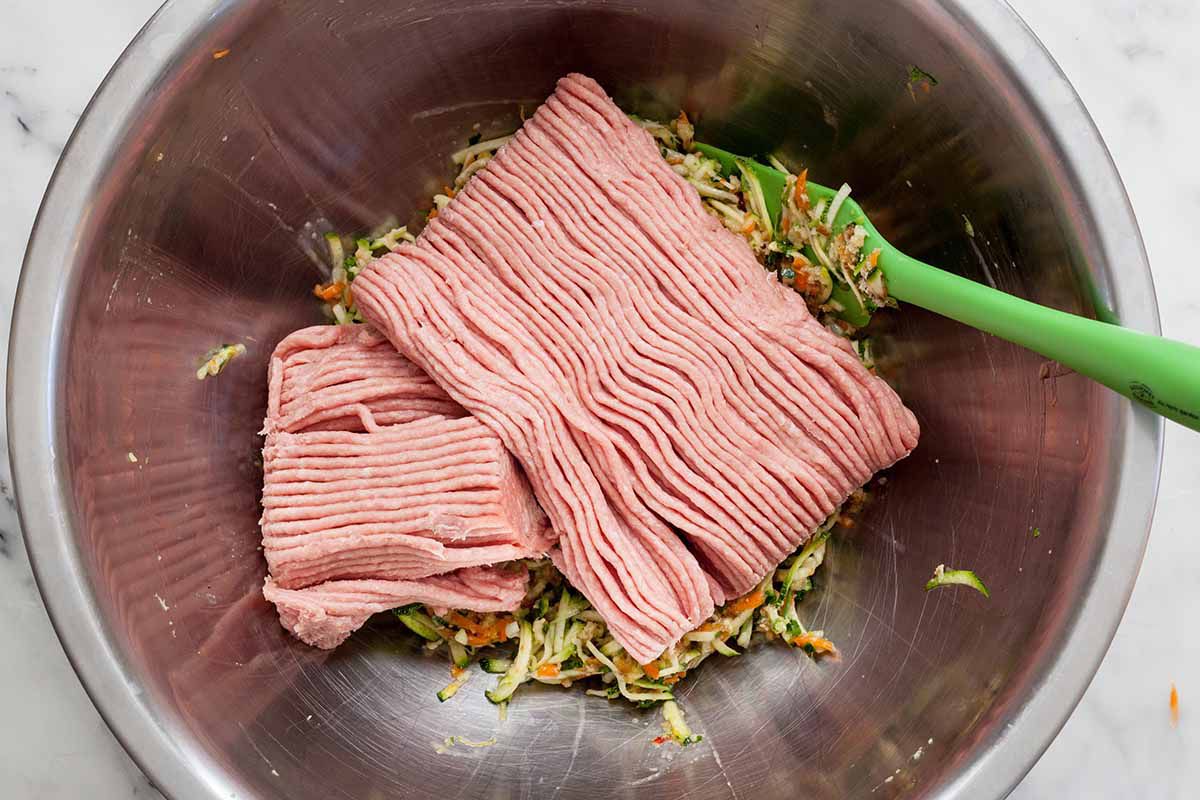 Turkey Meatloaf ingredients mixed together with turkey added