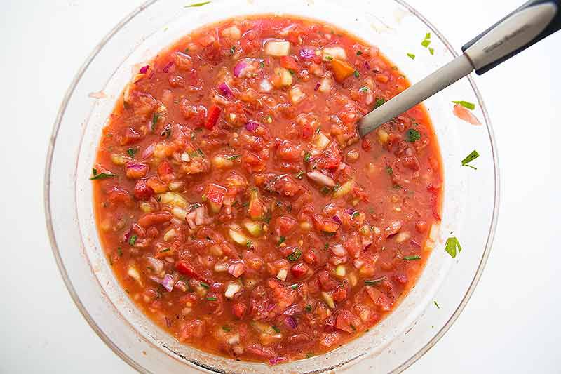 Gazpacho in a bowl after the ingredients have been lightly blended by an immersion blender