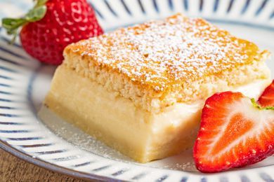 magic cake on a plate with strawberries