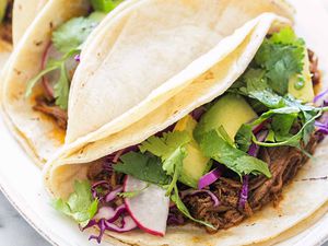 mexican pulled pork tacos in slow cooker
