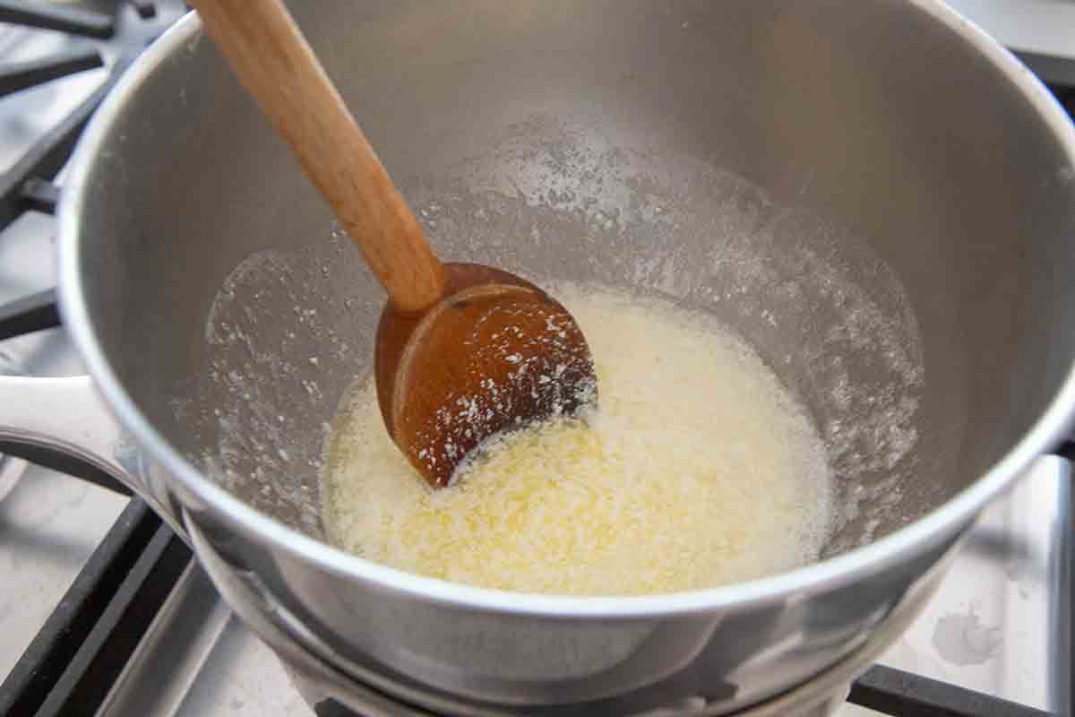 Heat butter and creme fraiche over double boiler
