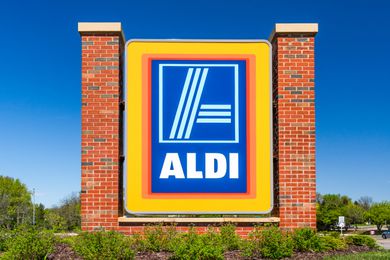 A large ALDI sign outside an ALDI store