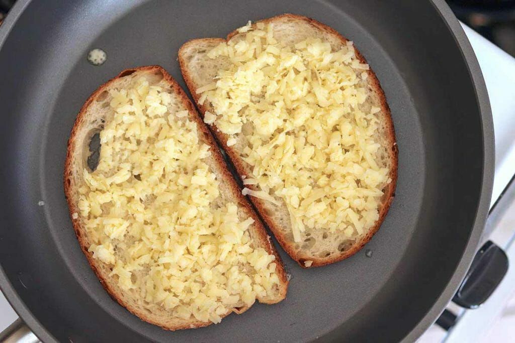 Melting the cheese for a grilled cheese BLT