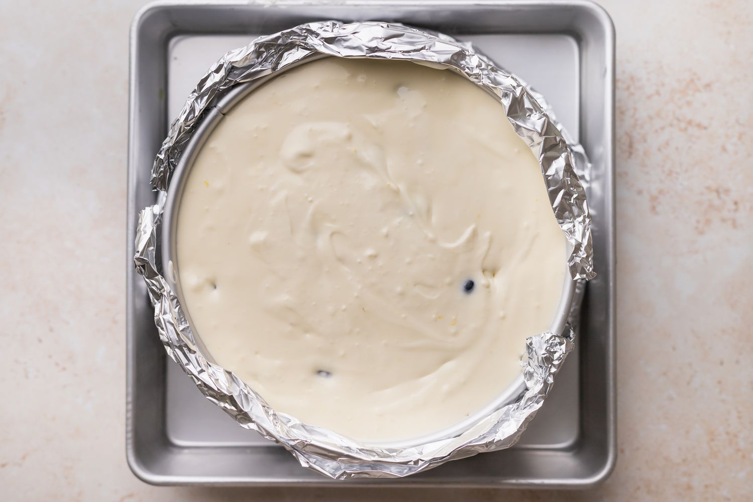 Place springform pan in roasting pan.