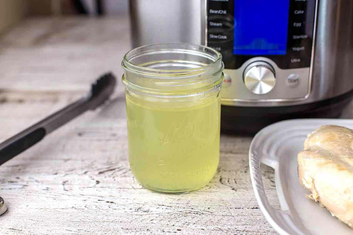 Instant pot chicken broth in a canning jar