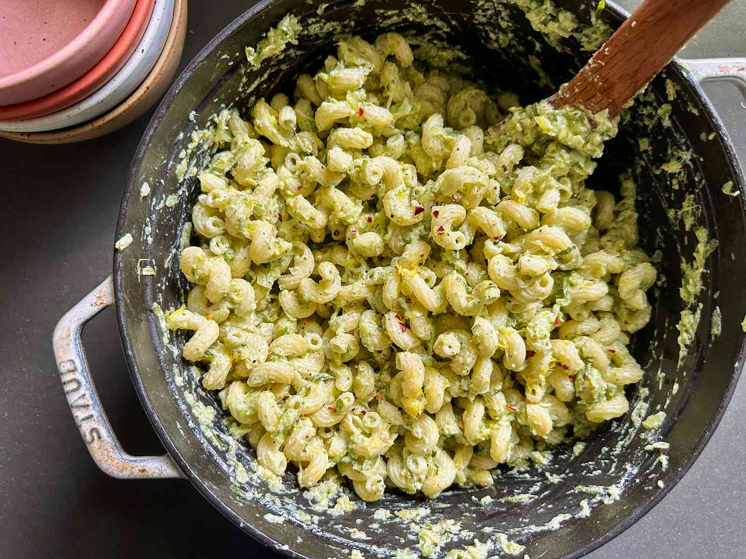 5-ingredient zucchini pasta in a pot with a wooden spoon